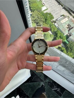 Diamond Bulova Futuro Millennia Gold Mother of Pearl 32mm Watch